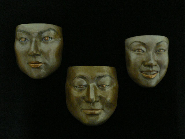 木粉粘土で作った三人の顔
